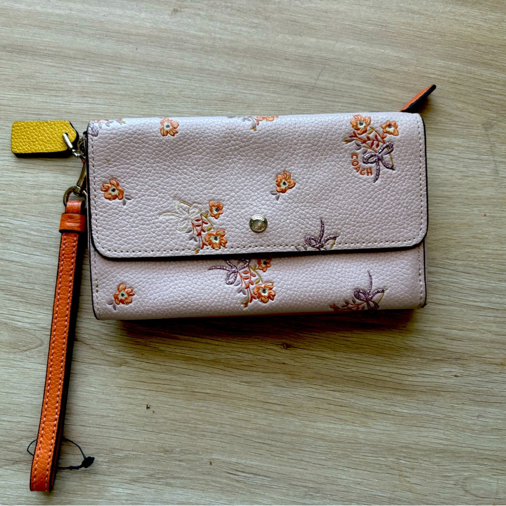 HARD TO FIND COACH triple compartment wristlet. Color block floral.
